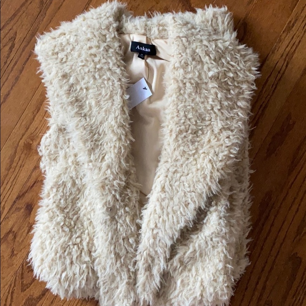 BLOW OUT SALE. NWT Shag long vest $20